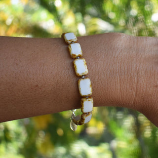 white glass beaded bracelet on wrist