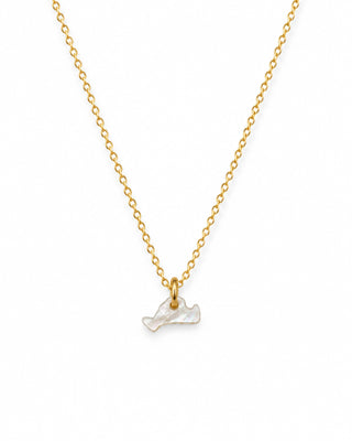 gold chain with a tiny marthas vineyard island shaped pendant on a white background