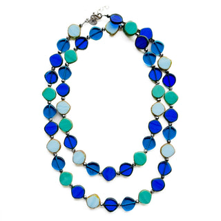 ocean blues glass beaded long circle necklace with sterling silver findings on white background
