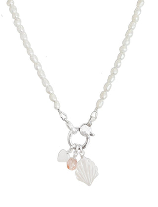 tiny pearl white freshwater pearl charm holder necklace with tiny mother of pearl heart charm tiny pink crystal charm and white scallop shell charm