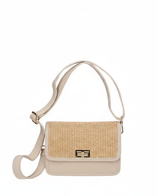 Woven handbag with beige strap on a white background
