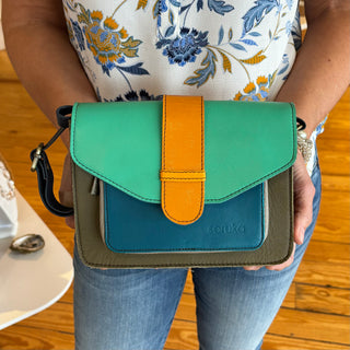Soruka Leather 100% Recycled Materials Crossbody Turquoise Bag in Hand