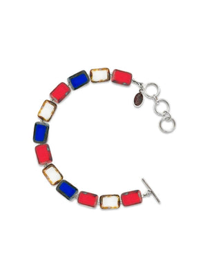 A red white and Blue beaded bracelet with a clasp on a white background
