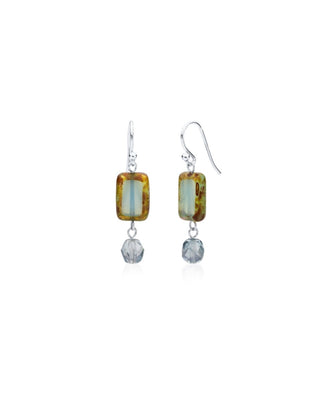 Cloudy blue glass and crystal sterling silver earrings on white background