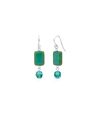 Turquoise glass and crystal sterling silver earrings on white background