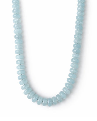 faceted aquamarine necklace on white background