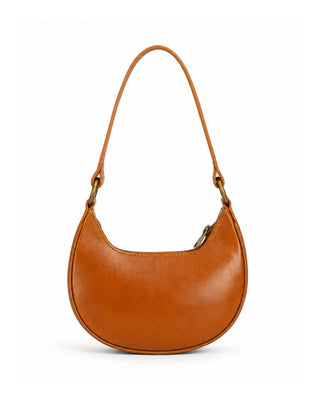 Brown leather handbag with a strap on a white background