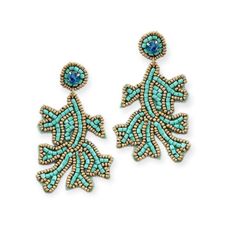 turquoise coral shaped sea life drop earrings on white background