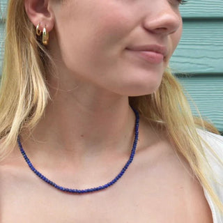 Lapis gemstone necklace on girl