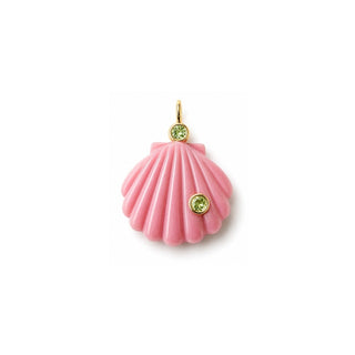Pink shell pendant with green gemstones on a white background
