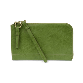 green wristlet wallet and crossbody on white background